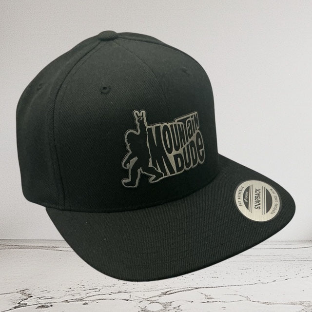 Black Yupoong Flat bill hat with Sasquatch Dew hat Patch