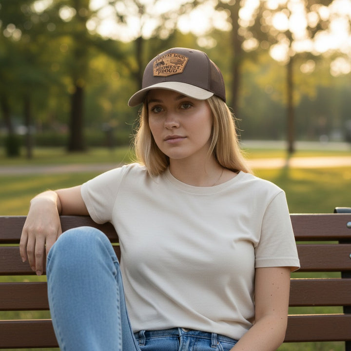 WeEngrave USA brown and tan Richardson 112 trucker hat with engraved leather patch featuring a tractor and USA map with text Country Loud Midwest Proud.