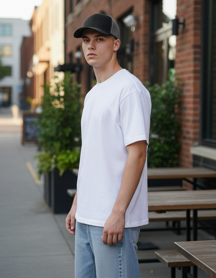 WeEngrave USA black and charcoal trucker hat with six-panel construction and adjustable snapback.
