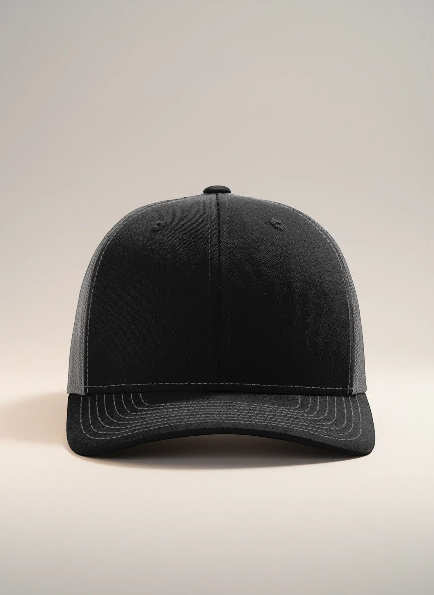 WeEngrave USA black trucker hat with charcoal mesh back, six-panel, mid-profile, and pre-curved bill.