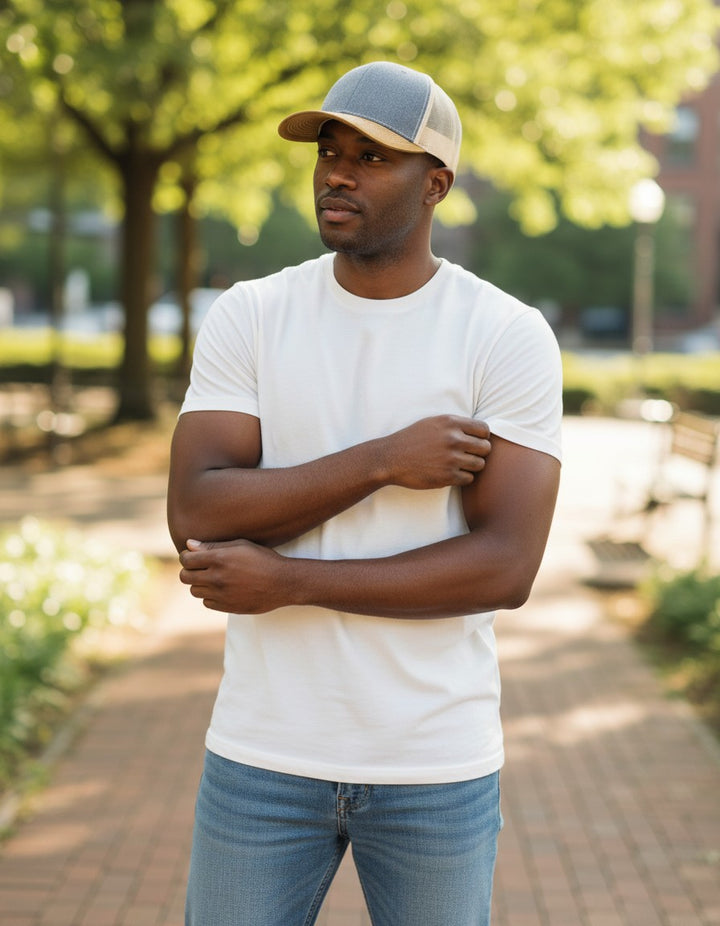 WeEngrave USA Heather Grey/Birch/Amber Gold trucker hat with precurved visor and cotton-poly mesh back.