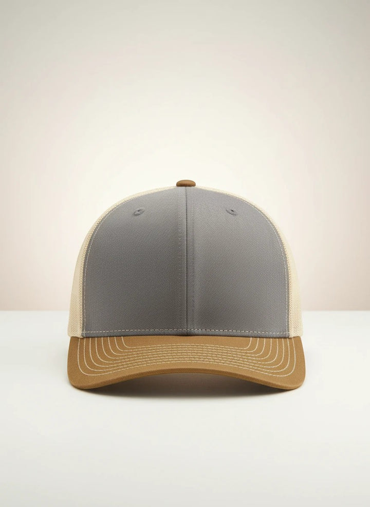 WeEngrave USA heather grey trucker hat with tan mesh back and tan brim. Mid profile, precurved visor, cotton sweatband.