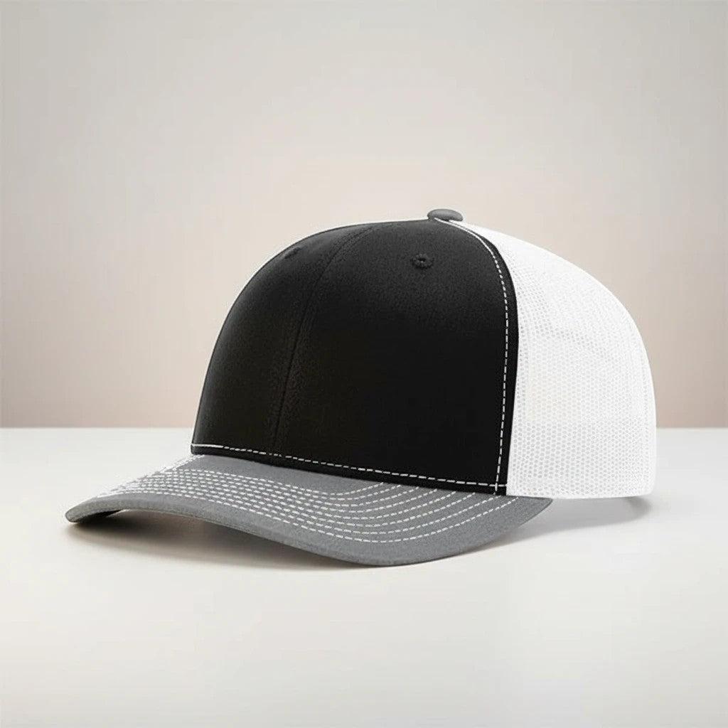 WeEngrave USA black, white, and heather grey trucker hat with a structured front and mesh back.