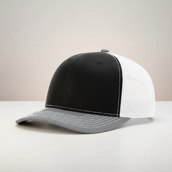 WeEngrave USA black, white, and heather grey trucker hat with a structured front and mesh back.